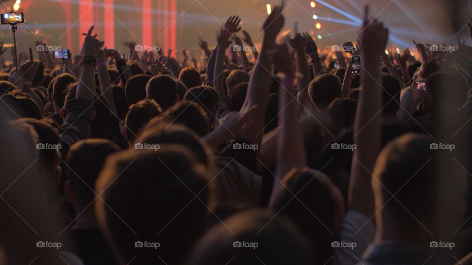 Hands of fans at a concert