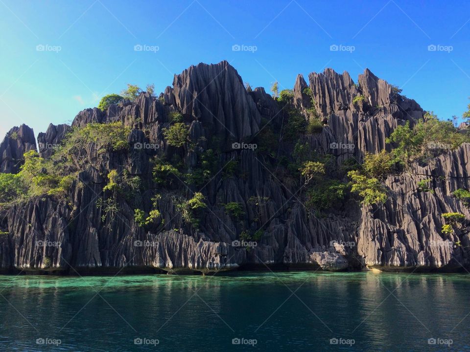 View of mountain against water