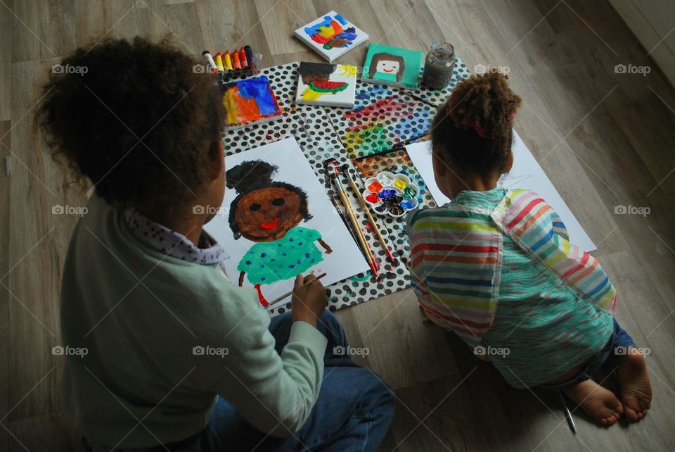 Little girl of mixed race painting