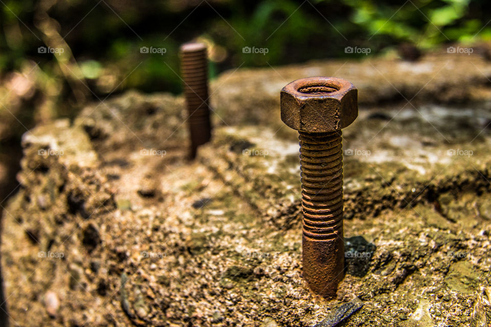 bolt and nut rusted on concrete