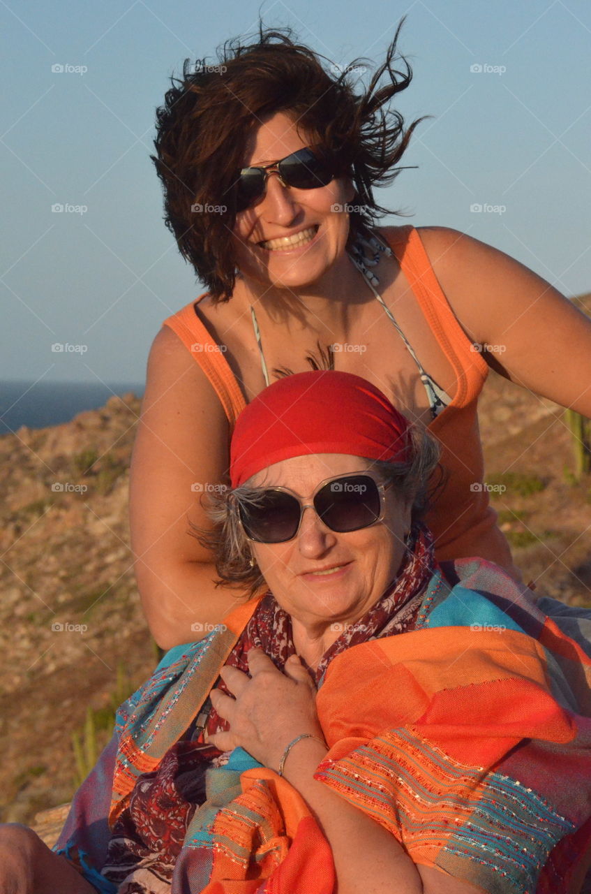 Mum and daughter at sunset light 
