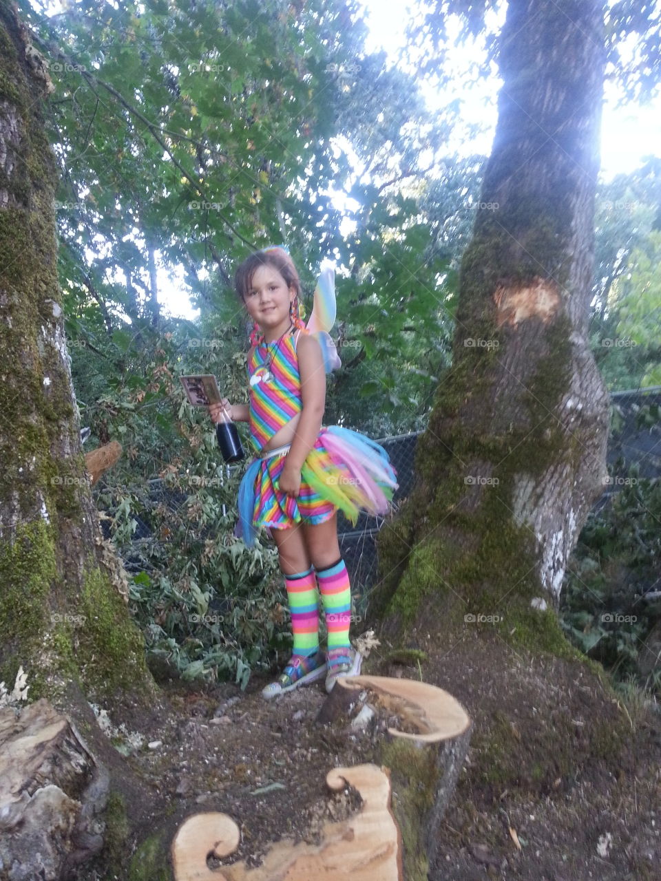 girl as fairy in tree