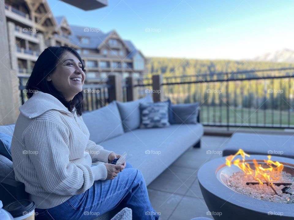 Enjoying a warm fire on a cool, crisp day