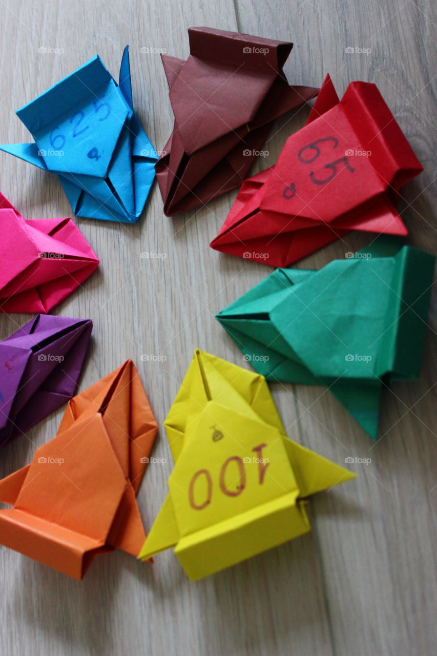 origami paper work cars around circle geometric star