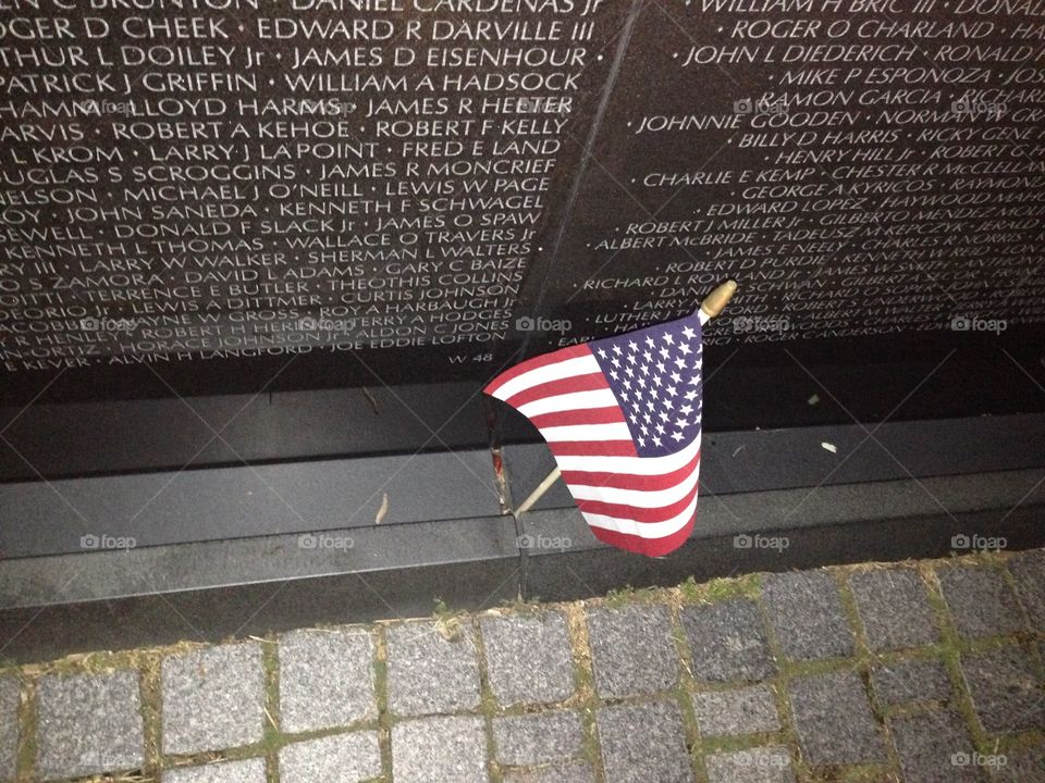 A flag left at the Vietnam War memorial in Washington DC