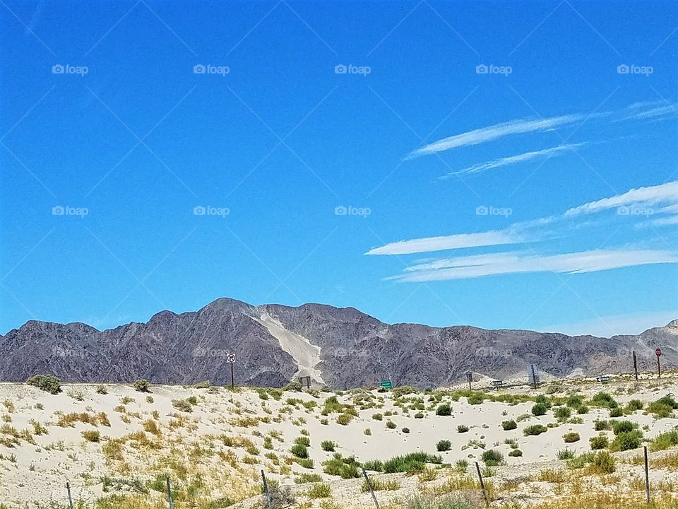Desert landscape with blown sand collected in the foothills!