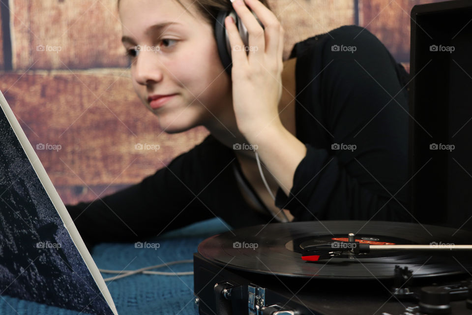 Young woman listening to music