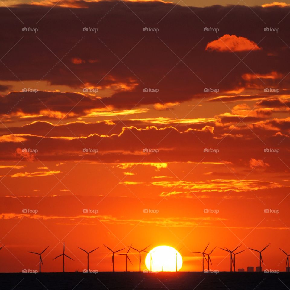 Sunset by the windmills