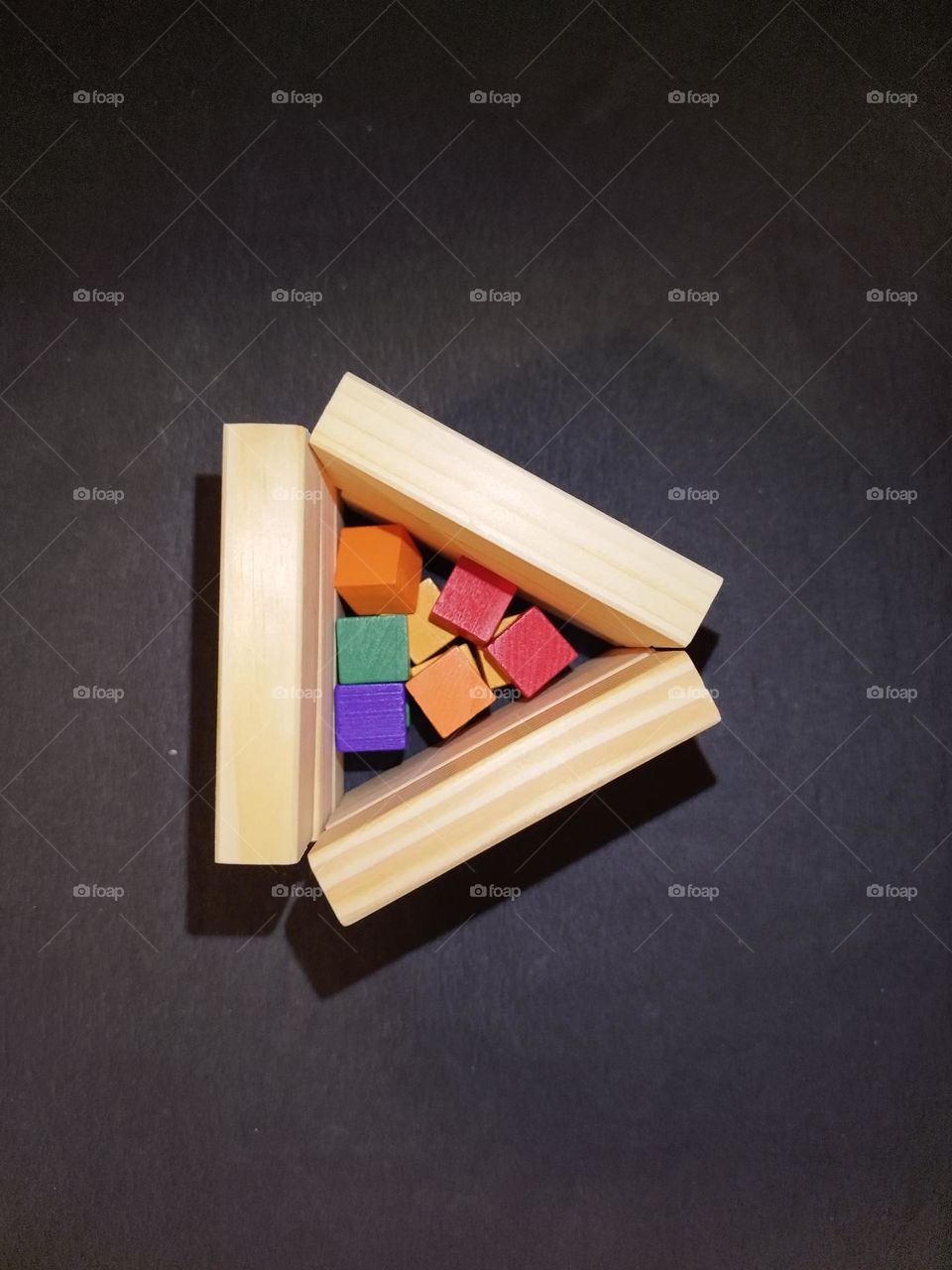 wooden pieces coloured triangle