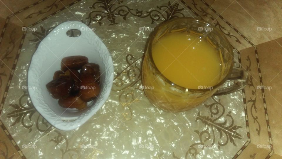 Juice of orange and dates.