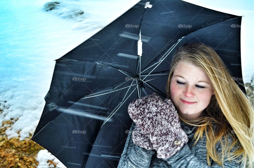 Portrait of woman with umbrella