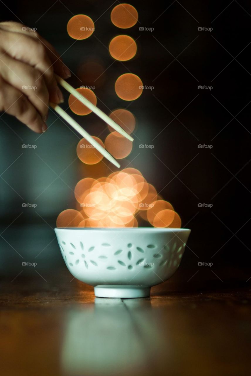 Light Bokeh in a Bowl with Chopsticks