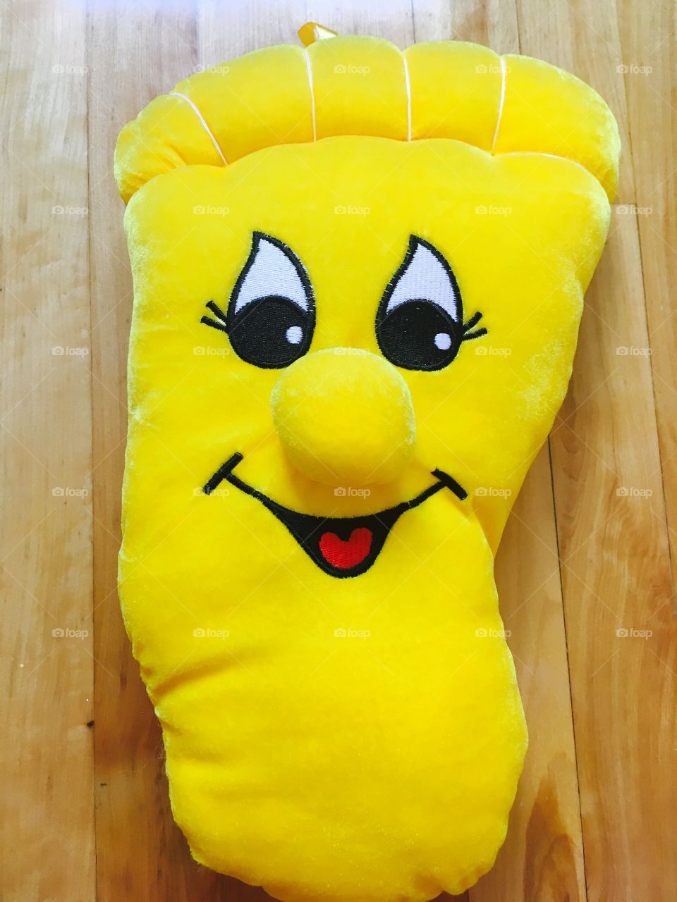 This picture is amazing because it represents a smile in a very bright and happy colour which is yellow . 