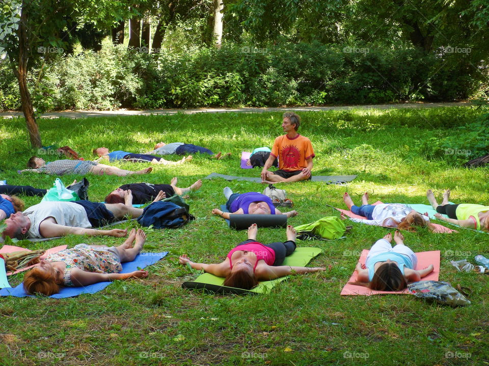 group of people doing yoga outdoors, Ukraine, Kiev