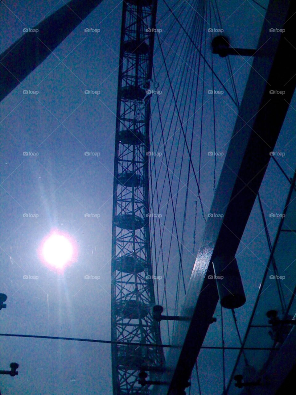 The London Eye. The sun shines on the London Eye