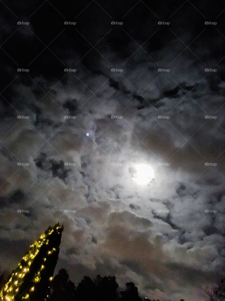 fullmoon, clouds and christmas lights