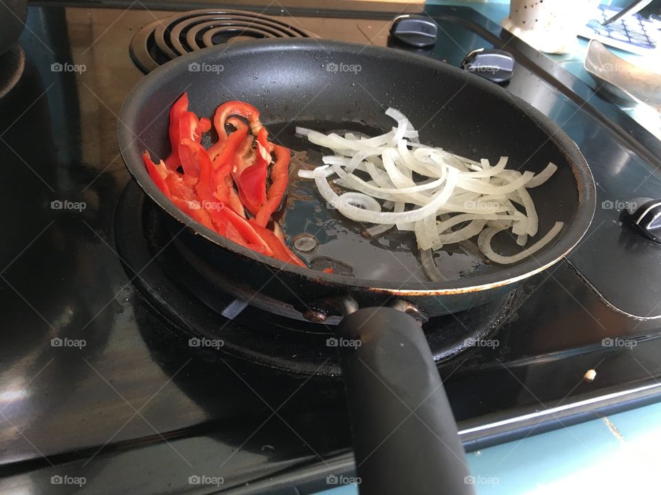 Pizza toppings being prepared 