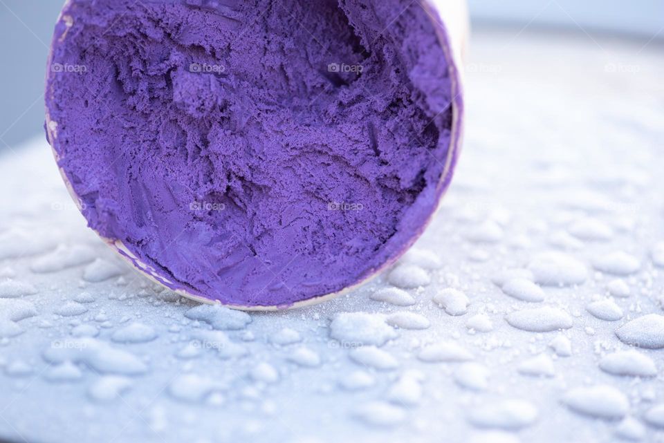 Frozen ube ice cream in a snowy frozen weather.