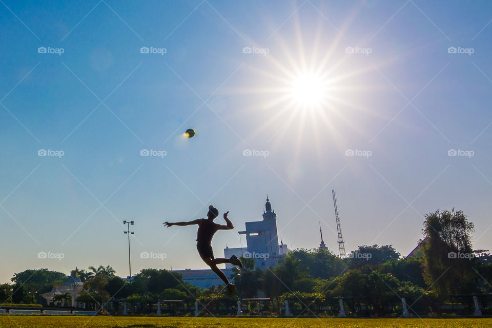 jump high to smash the ball