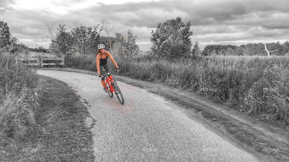 b&w lady cyclist