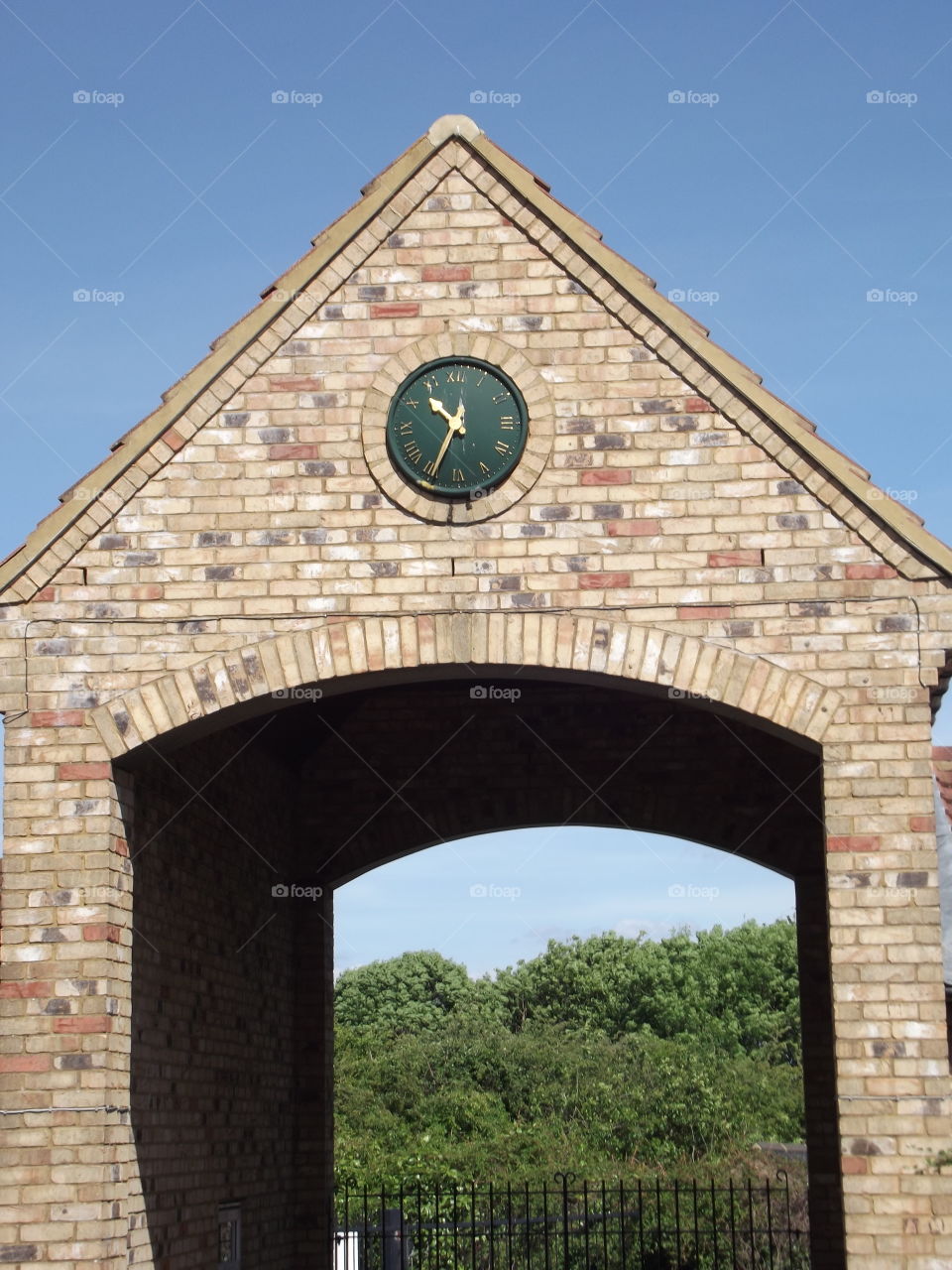 Clock On A Bricked Arch