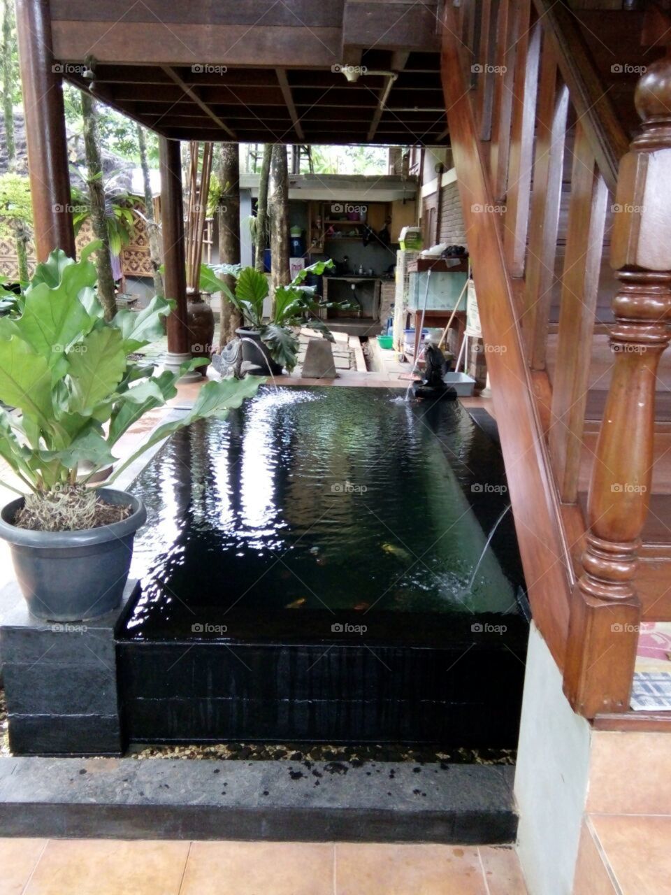fish pool under the stair