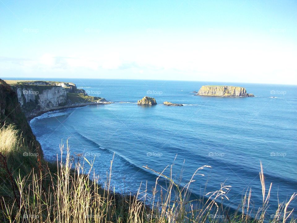 cliffs and an island on the coast of Northern Ireland