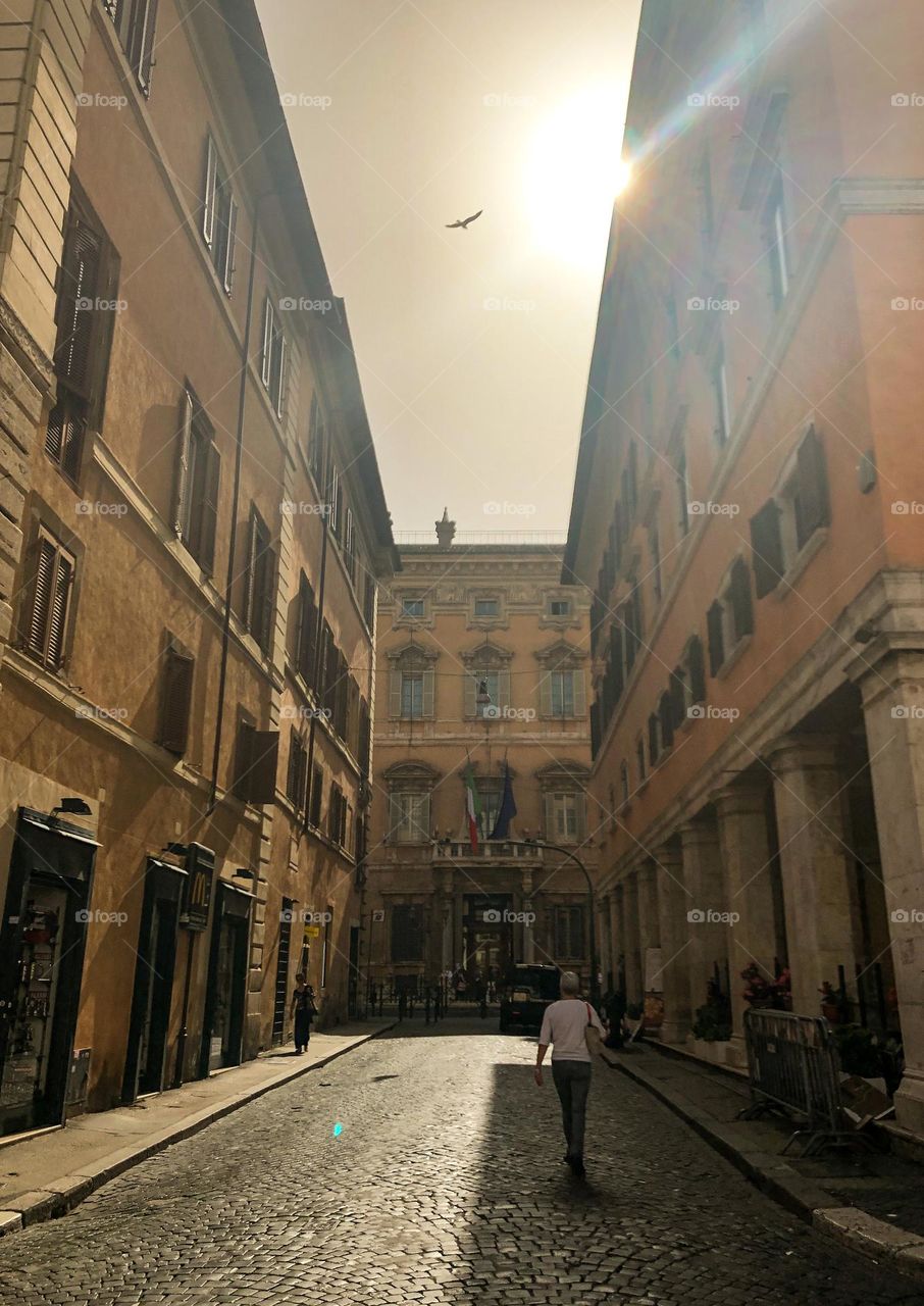 Rectangle building with rectangle windows and shutters in Rome Italy 