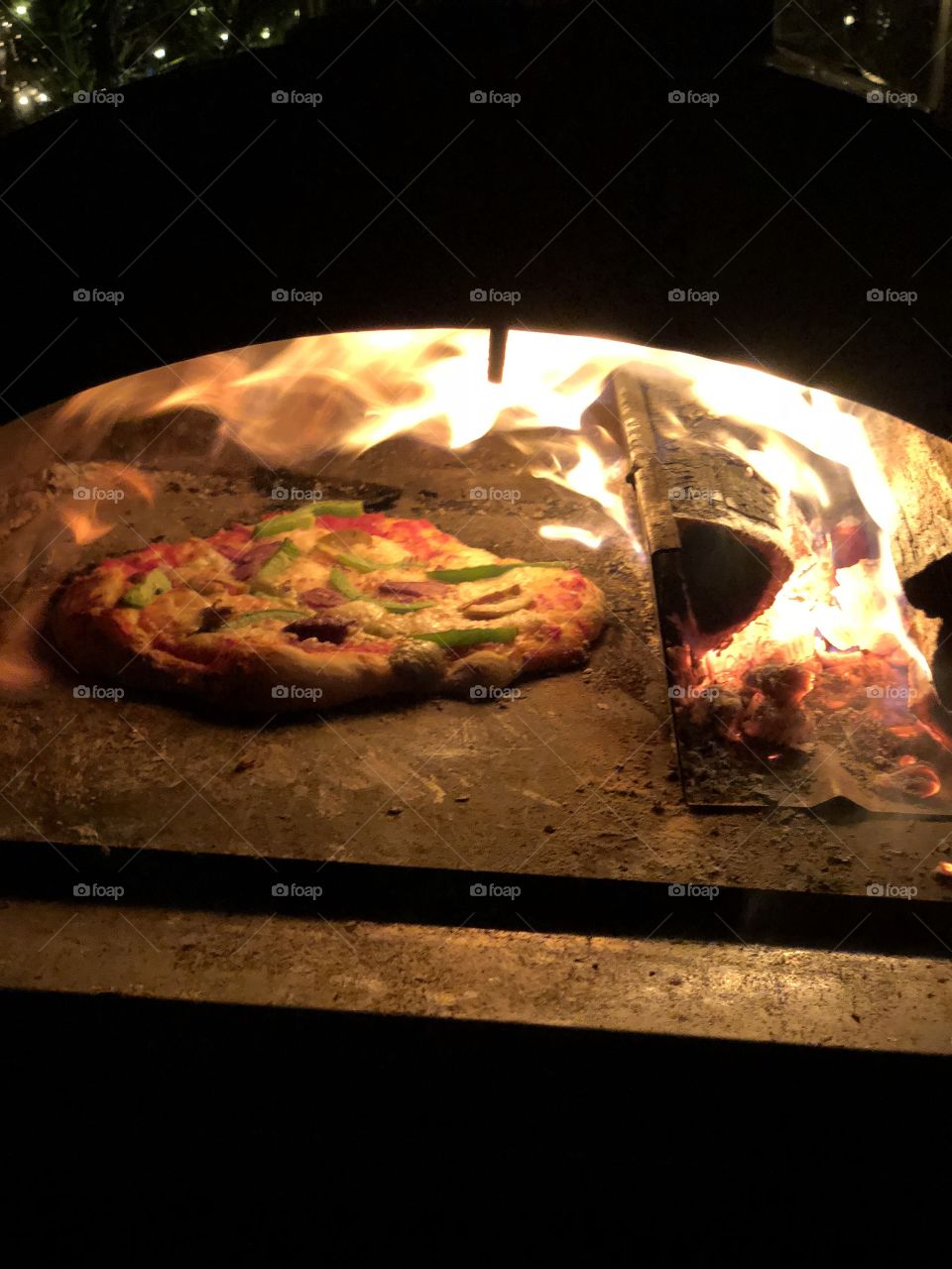 Traditional pizza in the Making, 400+ degrees, just like it should be