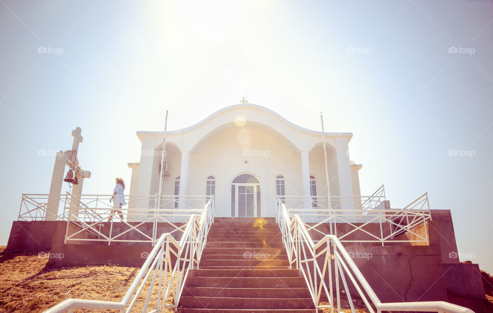 Woman On Summer Travel Outside Of A Chapel
