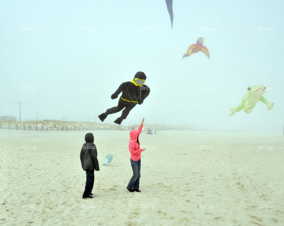 Flying kites on the beach