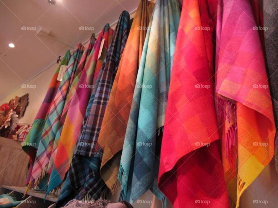 Colourful scarves of friends hung up indoors