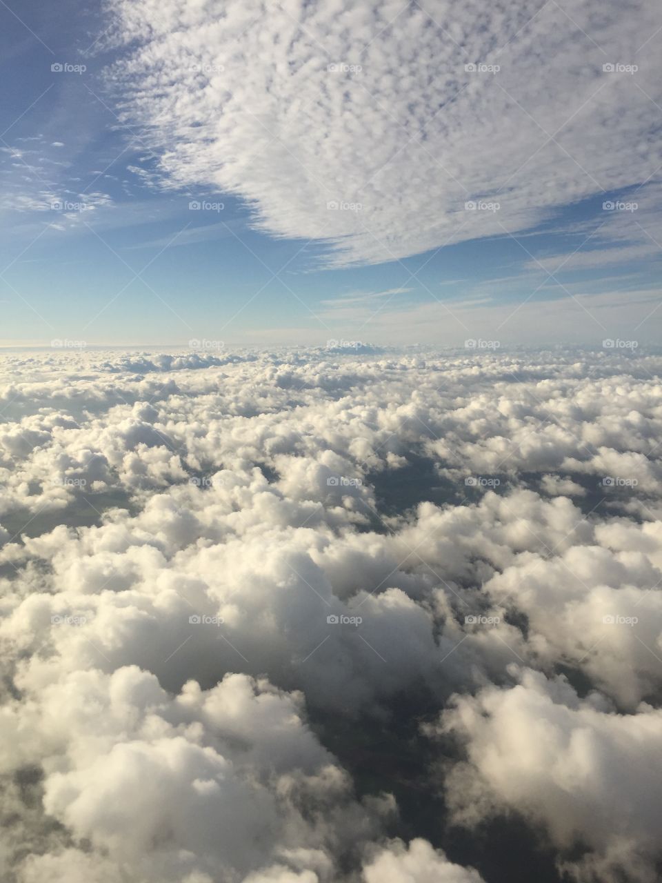 View from above between the soft clouds