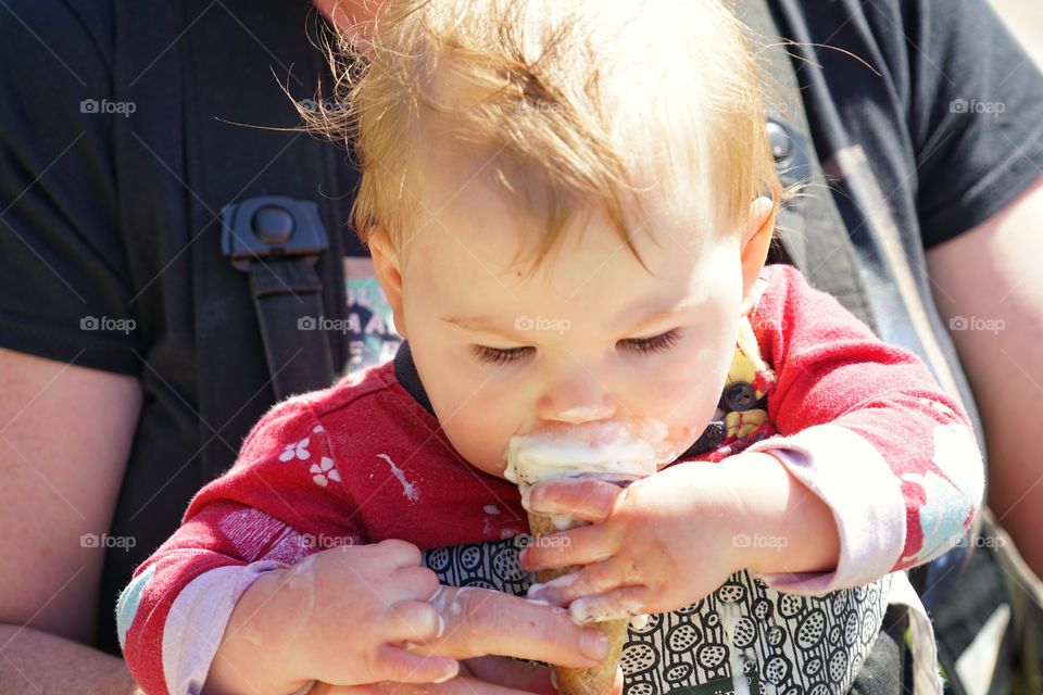 Baby Girl Eating Vanilla Ice Cream