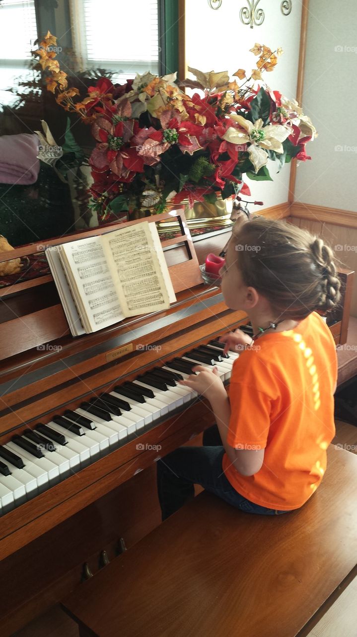 Girl Playing the Piano