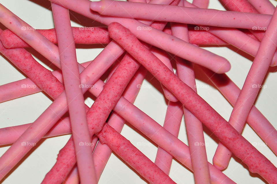 Strawberry cream covered biscuit sticks
