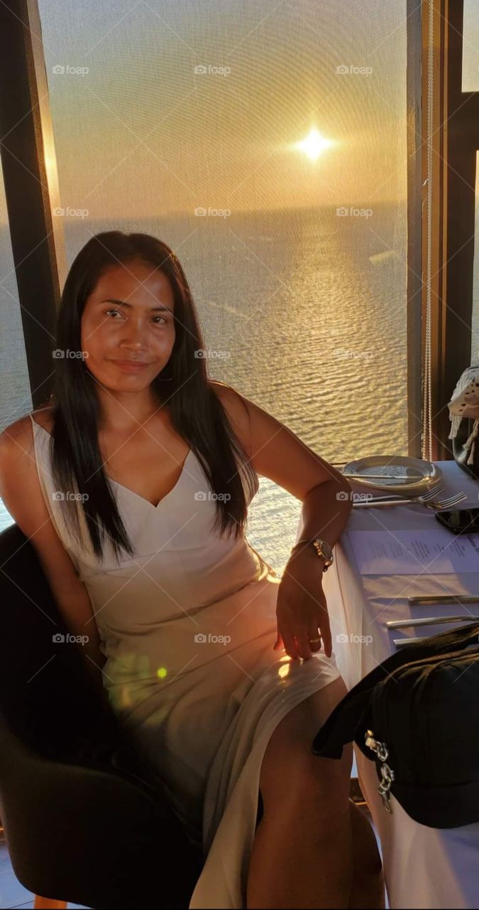 Asian woman and sunset