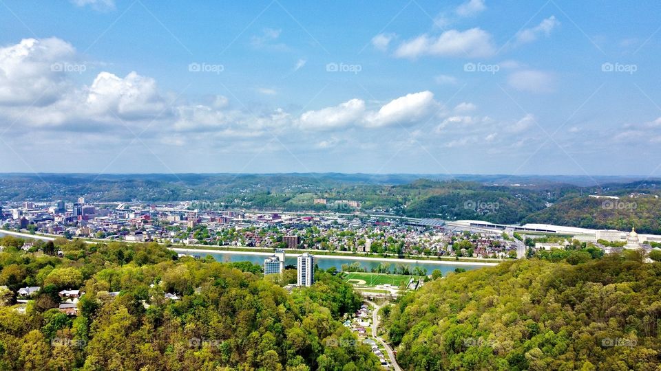 Flying down the valley to the beautiful downtown Charleston WV taken by aerial pointe drone 