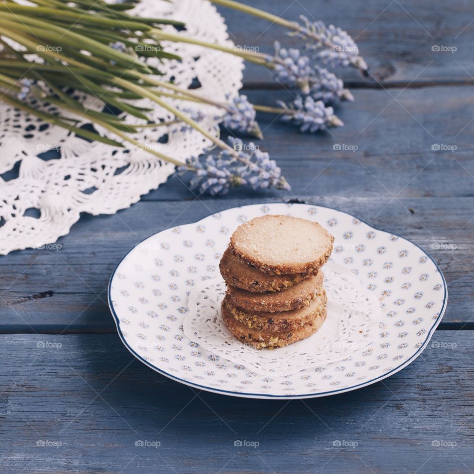 Homemade cookies on the saucer on the wooden table 