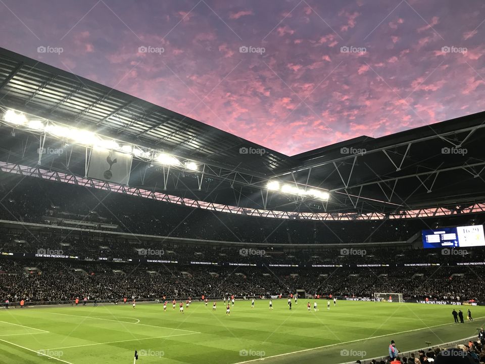 Wembley stadium at sunset