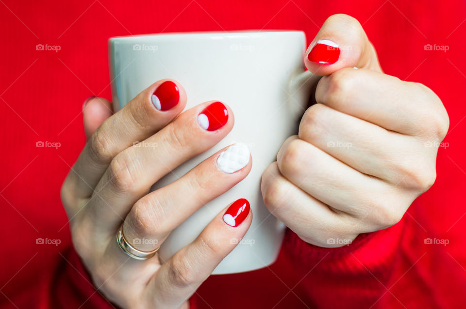 woman hand with cup of tea