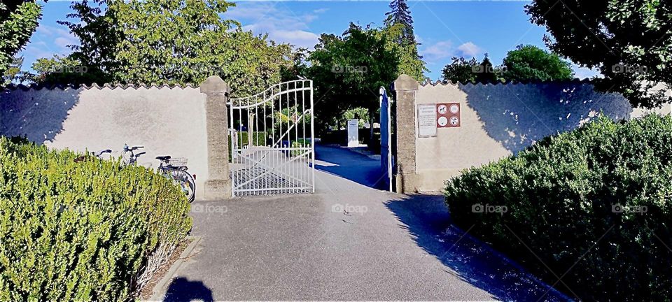 This is the gate to the „Waldfriedhof“, the forest cemetery outside „Straubing“, „Bavaria“, a charming town on the „Danube“ or „Donau“. The „Blue Danube“, a waltz was composed by „Johann Strauss II“ with the river in mind. 2023. Hypnotic Productions