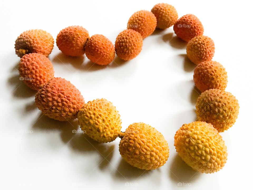 Fresh lychees arranged in a heart-shape. Got to love fruit!