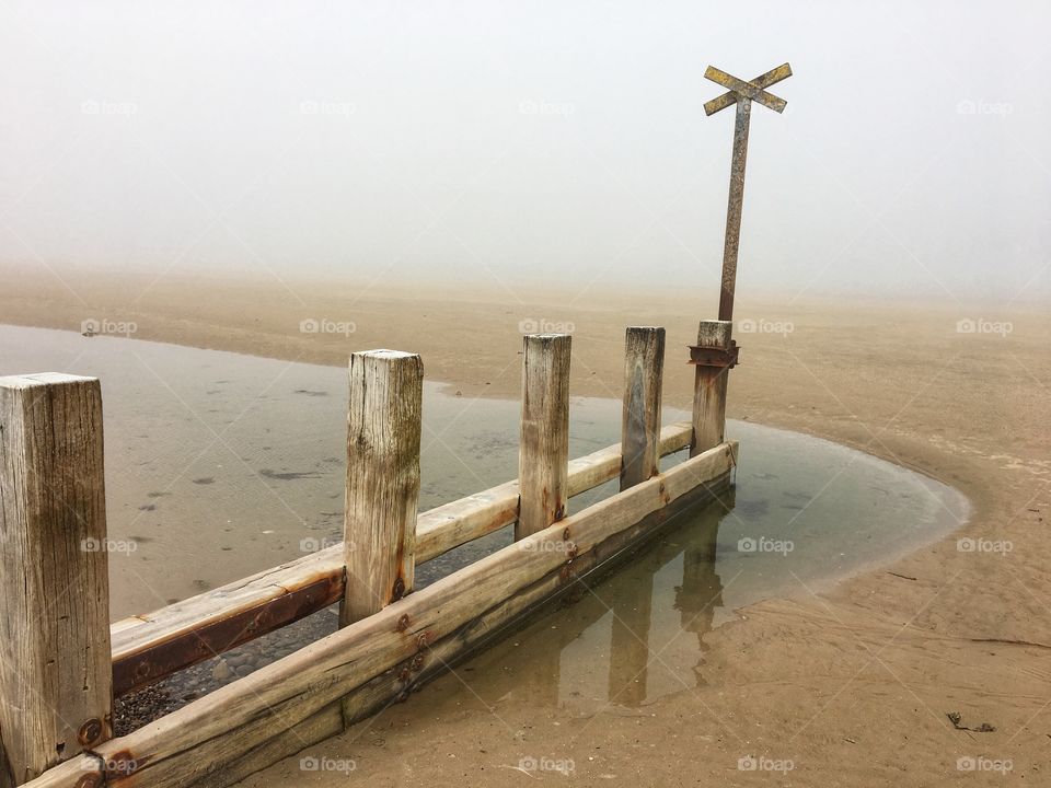 Findhorn wooden beach groyn visible just in between the mist rolling in from the sea ... Love Scotland  🏴󠁧󠁢󠁳󠁣󠁴󠁿