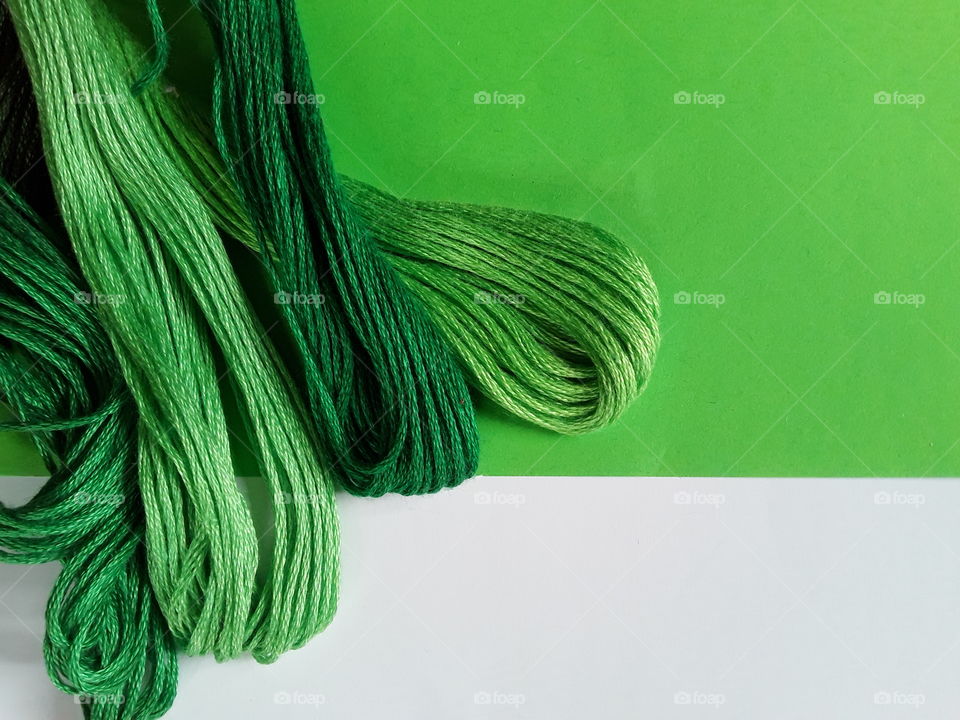 High angle view of green threads