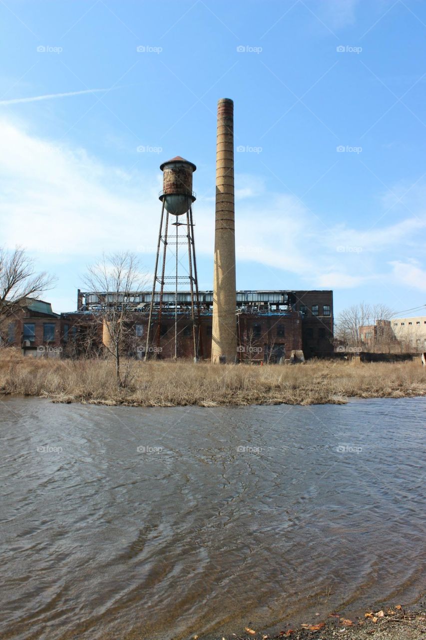 old factory smoke and water tower