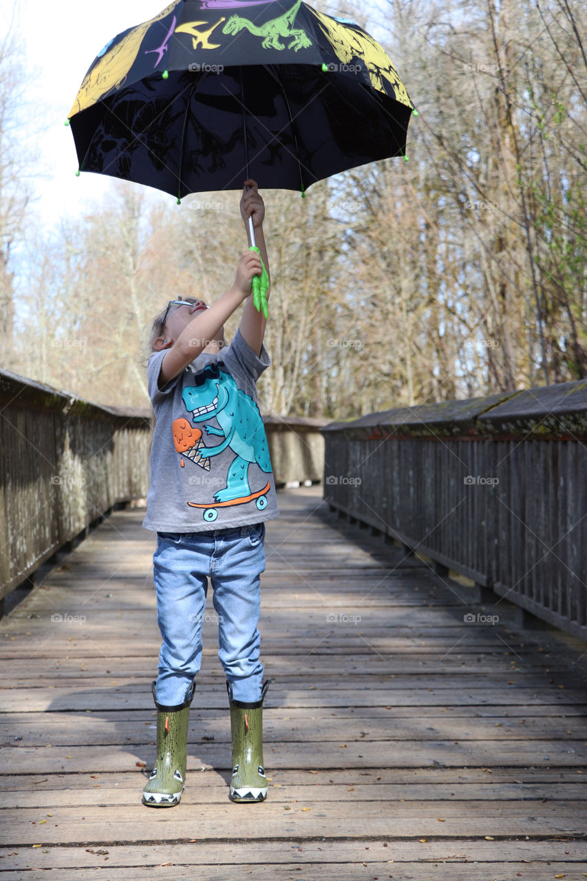 child with umbrella