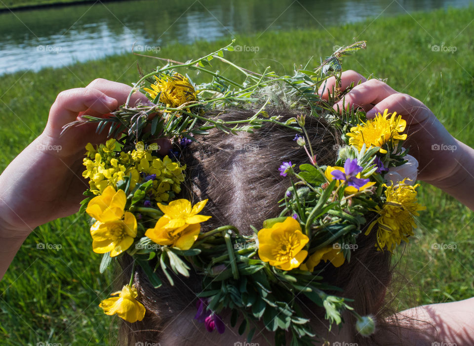 Real flowers crown, grassland, river