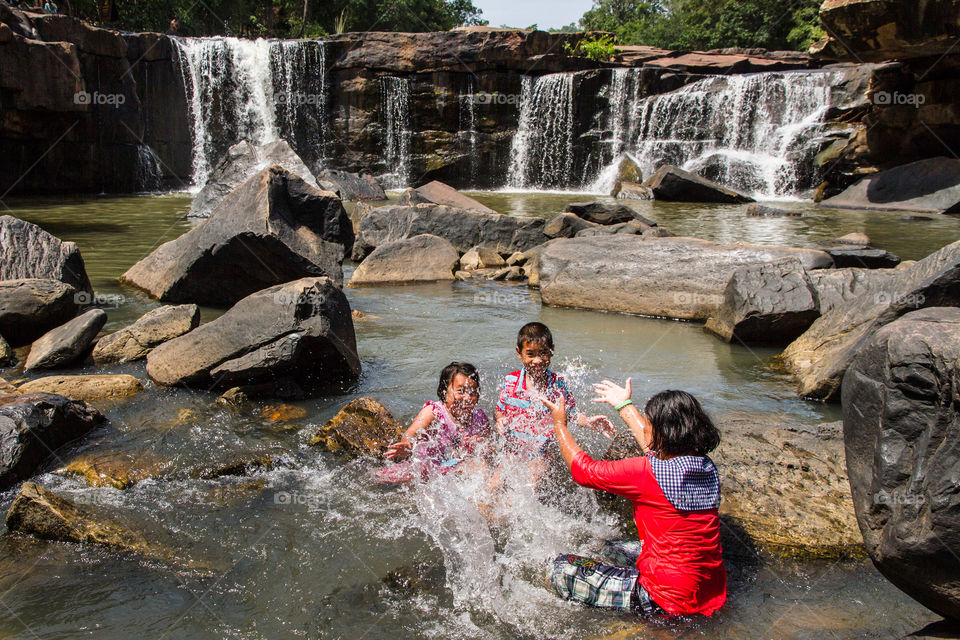 time to play . children playing waterfall 