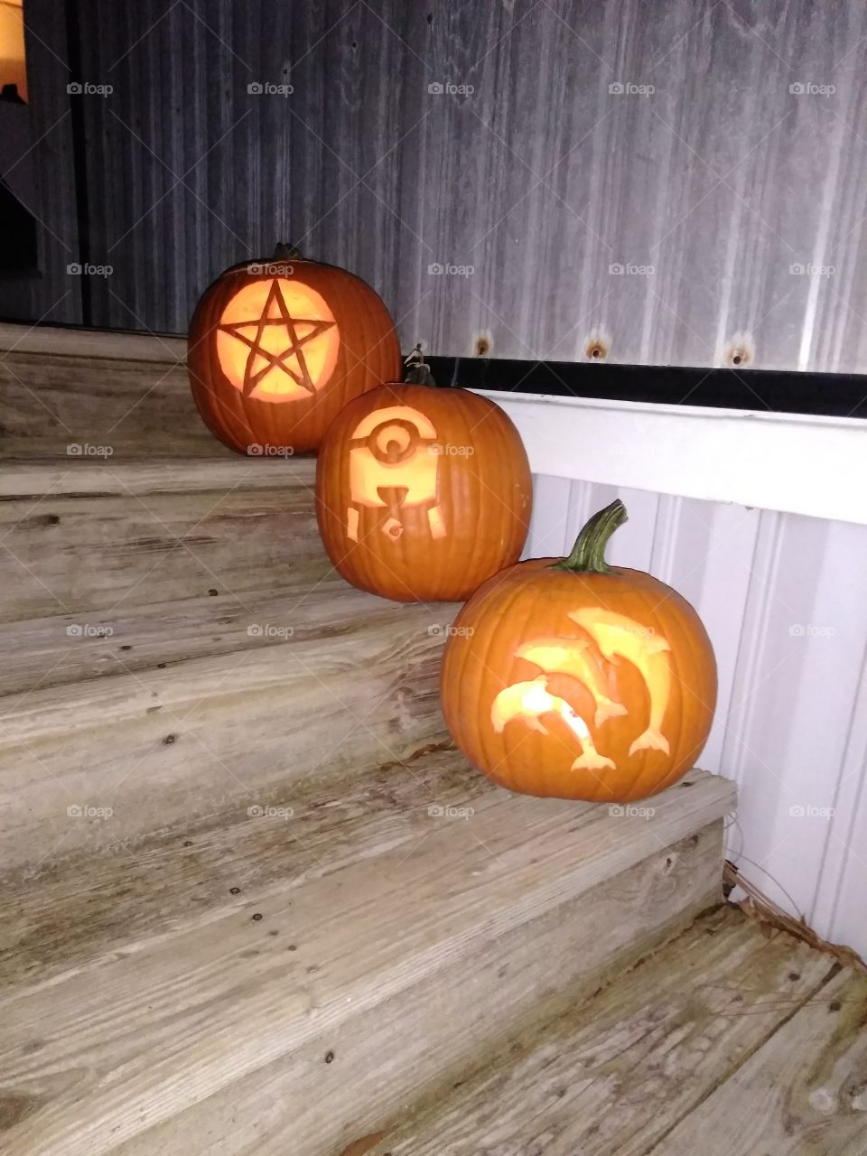 lit carved pumpkins